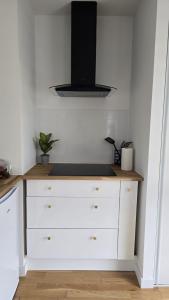 Appartements Vacances O Kastel - Studio Centre Ville proche de la mer : photos des chambres