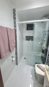 1 quadra da Praia e da Roda Gigante