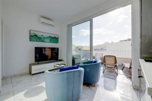 Charming 1BR Penthouse in Gzira