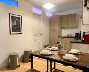 Appartements L-Escapade Romantique : photos des chambres