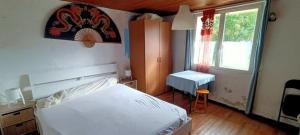 Maisons de vacances Petite maison rustique et atypique : photos des chambres