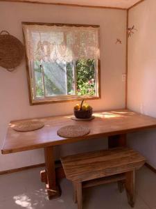 Cabaña entre parras