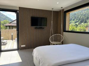 Chalets Le Grand Perce Neige & Jacuzzi a proximite de Gerardmer : photos des chambres