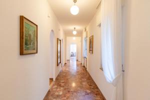 Domus Verona - Elegante residenza con affaccio su Porta Leoni