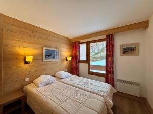 Charmant 2 pièces pour 4 aux Menuires, pied des pistes, proche commerces et piscine - FR-1-452-290