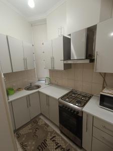 "ELITE" in the Center near the Theater