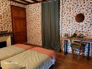 Appartements T3 avec jouissance jardin dans ancien presbytere : photos des chambres