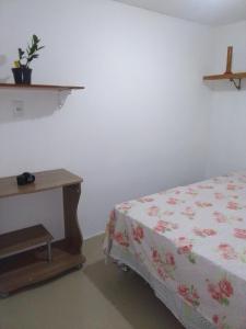 Kitnet na praia da Macumba no morro do Rangel