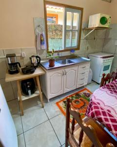 Casa com Varanda Gourmet a 1km da Praia l Pet Friendly I Wi-Fi & Garagem