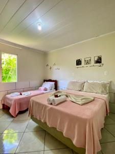 Casa com Varanda Gourmet a 1km da Praia l Pet Friendly I Wi-Fi & Garagem