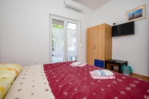 Apartments for families with children Palit, Rab - 4990