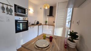 Appartements Vacances O Kastel - Studio Centre Ville proche de la mer : photos des chambres