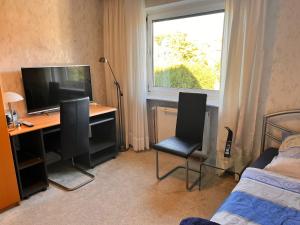 Apartment für 5 Personen mit Gartennutzung - Messezimmer