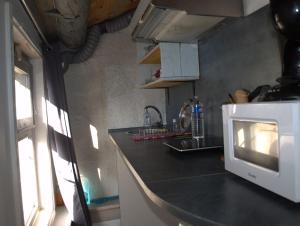 Appartements INSOLITE STUDIO -La Tour des Templiers- : photos des chambres