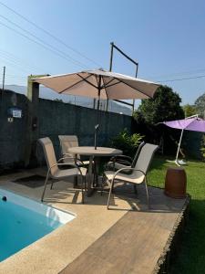 Rm hospedagem Ubatuba piscina