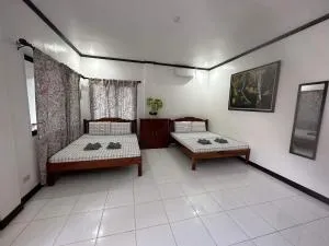 Room 1 Family Fuego Island Guest House By Fuego Island Private Resorts - Catulayan