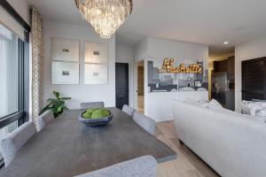 Elegant Corner Penthouse with Private Balcony, Skyline Views, Pool, and Gym