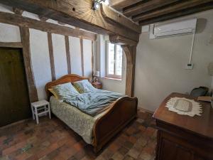 Maisons de vacances Gites modulables entre Loire et Sologne avec jardin et barbecue - FR-1-590-528 : photos des chambres
