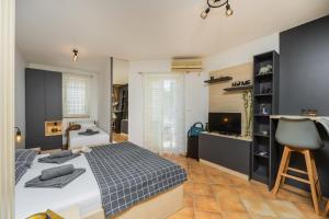 Studio with Balcony (3 Adults)  room in Adzic Apartments