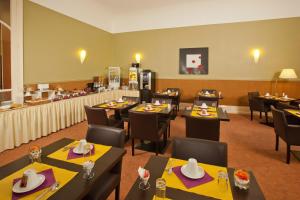 Appart'hotels Garden & City Luxeuil Ex Le Metropole et Les Thermes : photos des chambres
