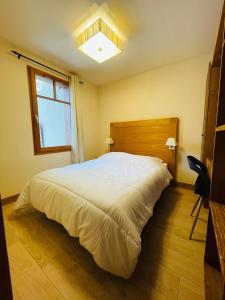 Appartements avec PISCINE INTERIEURE SAUNA Parking Etage 1 au Centre du Village dans Residence Cami Real : photos des chambres