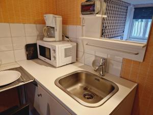 Maisons d'hotes Studio independant de 15m2 proche du Comet : photos des chambres