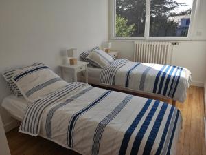 Maisons de vacances Maison 800 m de la plage pour 9 personnes : photos des chambres