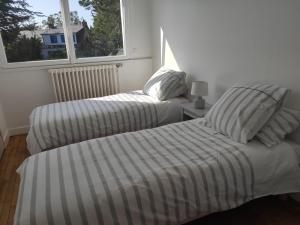 Maisons de vacances Maison 800 m de la plage pour 9 personnes : photos des chambres