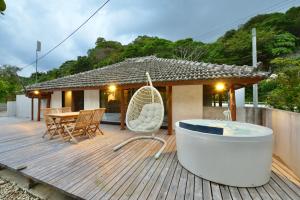 ヴィラコガチアラマンダ - 3hvězdičkové hotely ve městě Nago