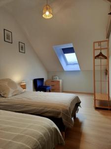 Maisons de vacances Le Pommier Gite neuf avec parking prive clos : photos des chambres