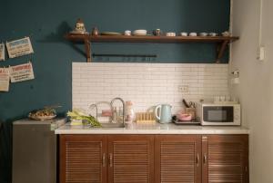 The Tin Homee Old Quarter Street View