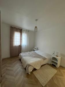 Appartements T3 proche toutes commodites : photos des chambres