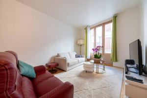 Appartements Maison des orchidees : photos des chambres