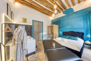 Appartements Suite bien etre - jacuzzi et sauna / love room : photos des chambres