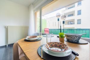 Appartements Escapade Confort au Coeur de la Ville Cosy&Moderne : photos des chambres