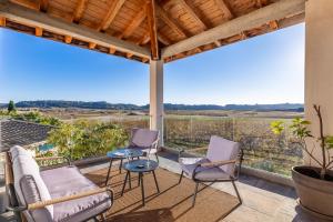 Villa Luxe piscine intérieure SPA chauffée vue exceptionnelle sur vignoble