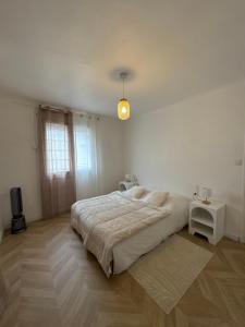 Appartements T3 proche toutes commodites : photos des chambres