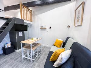 Appartements L-Escapade - Charmant studio au coeur du village : photos des chambres