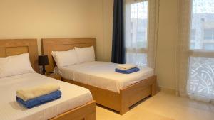 Ollystays Mangroovy Seaview 2BR Beach and Pool Free access