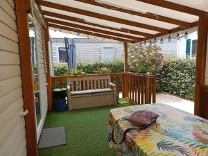 Chalets Mobil Home dans camping familial : photos des chambres