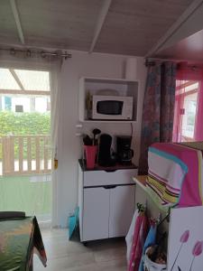 Chalets Mobil Home dans camping familial : photos des chambres