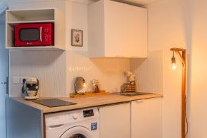 Appartements Le petit studio du stadium avec parking gratuit : photos des chambres