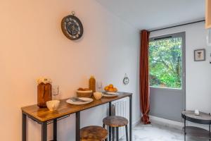 Appartements Le petit studio du stadium avec parking gratuit : photos des chambres
