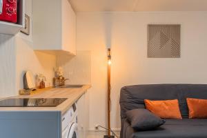 Appartements Le petit studio du stadium avec parking gratuit : photos des chambres