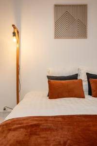 Appartements Le petit studio du stadium avec parking gratuit : photos des chambres