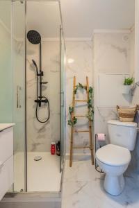 Appartements Le petit studio du stadium avec parking gratuit : photos des chambres