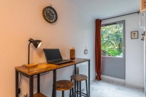 Appartements Le petit studio du stadium avec parking gratuit : photos des chambres
