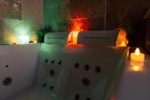 Appartements Evasion romantique & spa : photos des chambres