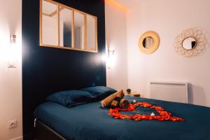 Appartements Evasion romantique & spa : photos des chambres