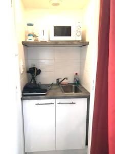 Appartements LE CASTEL LILY - Calme - Face aux Parcs - Immeuble de caractere : photos des chambres